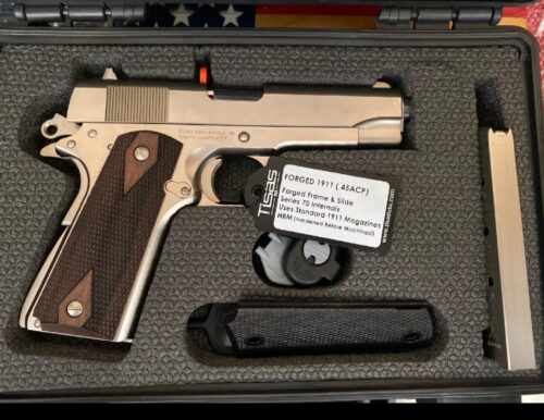 Tisas 1911 pistol in a protective case.