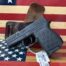 Handgun on American flag background