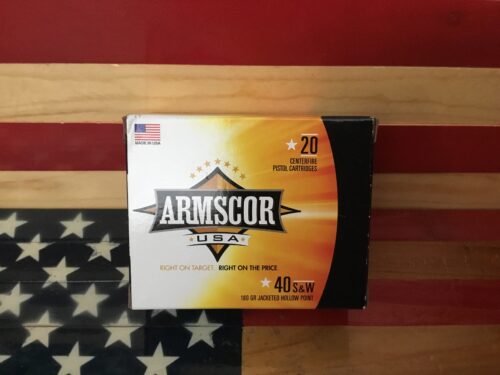 Armscor USA .40 S&W ammunition box on flag.