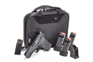 Handgun with magazines and tactical bag