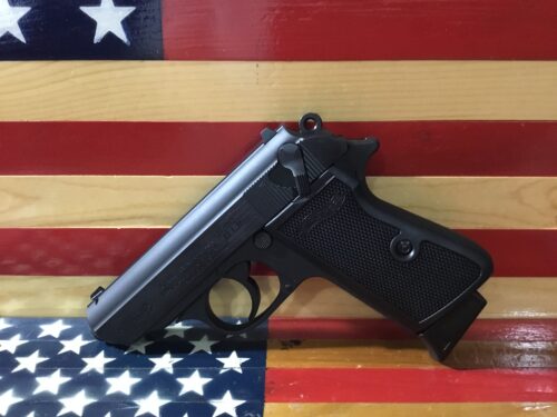 Handgun with American flag background