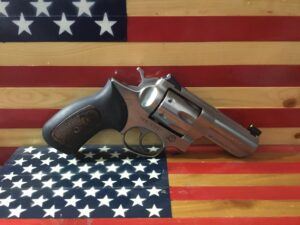 Silver revolver on American flag background