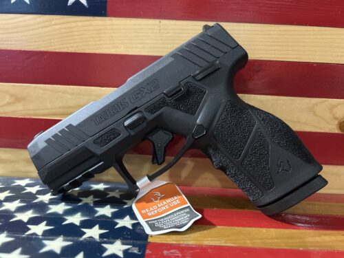 Taurus GX2 pistol on American flag background.