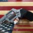 Revolver on American flag background