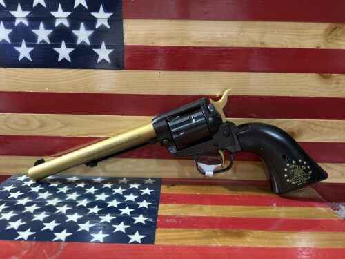 Pistol on American flag background.