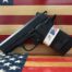 Handgun on American flag background