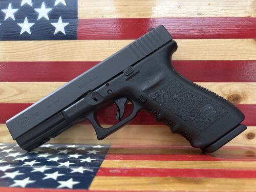 Black handgun on American flag background