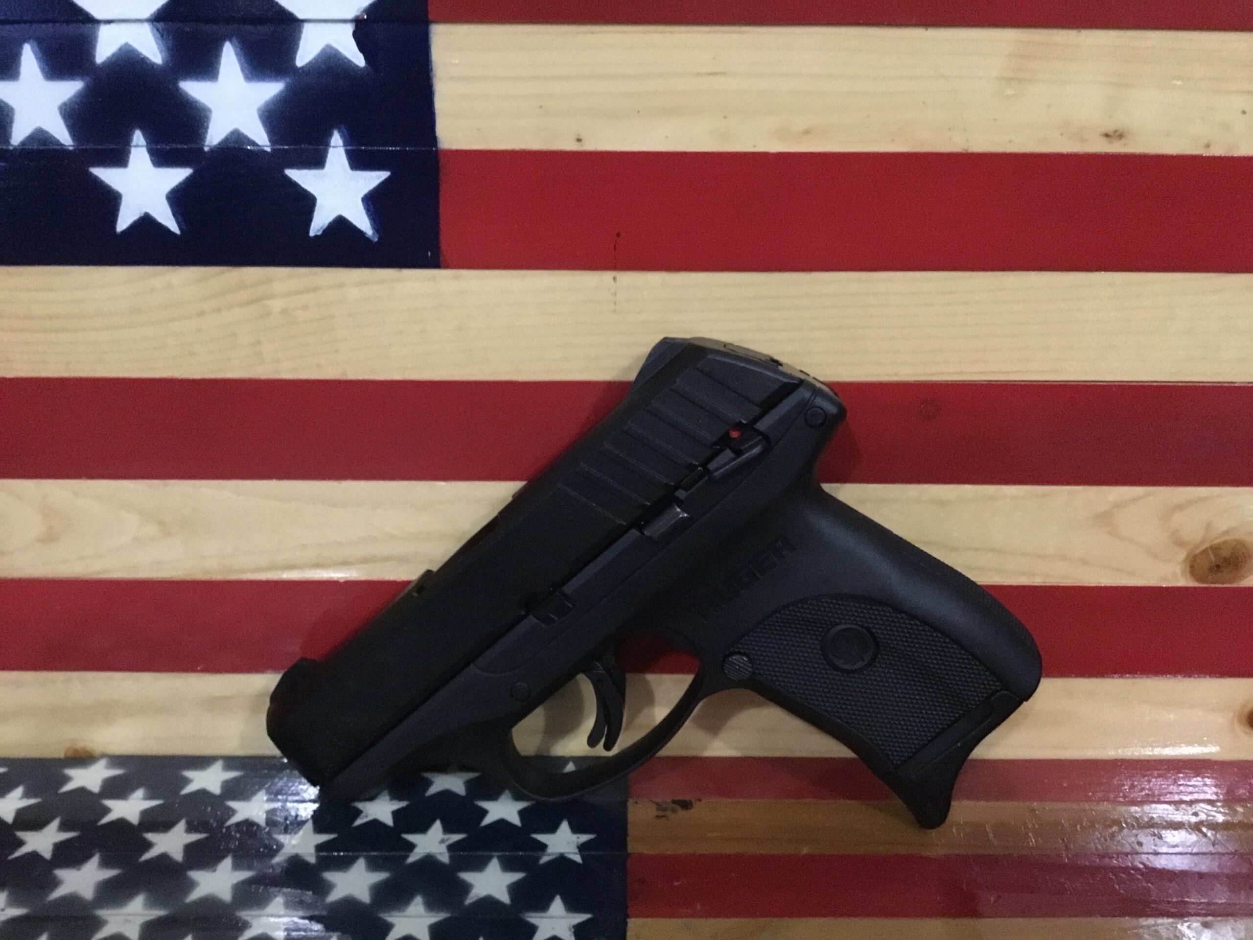Handgun on American flag background