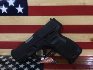 Handgun on American flag background