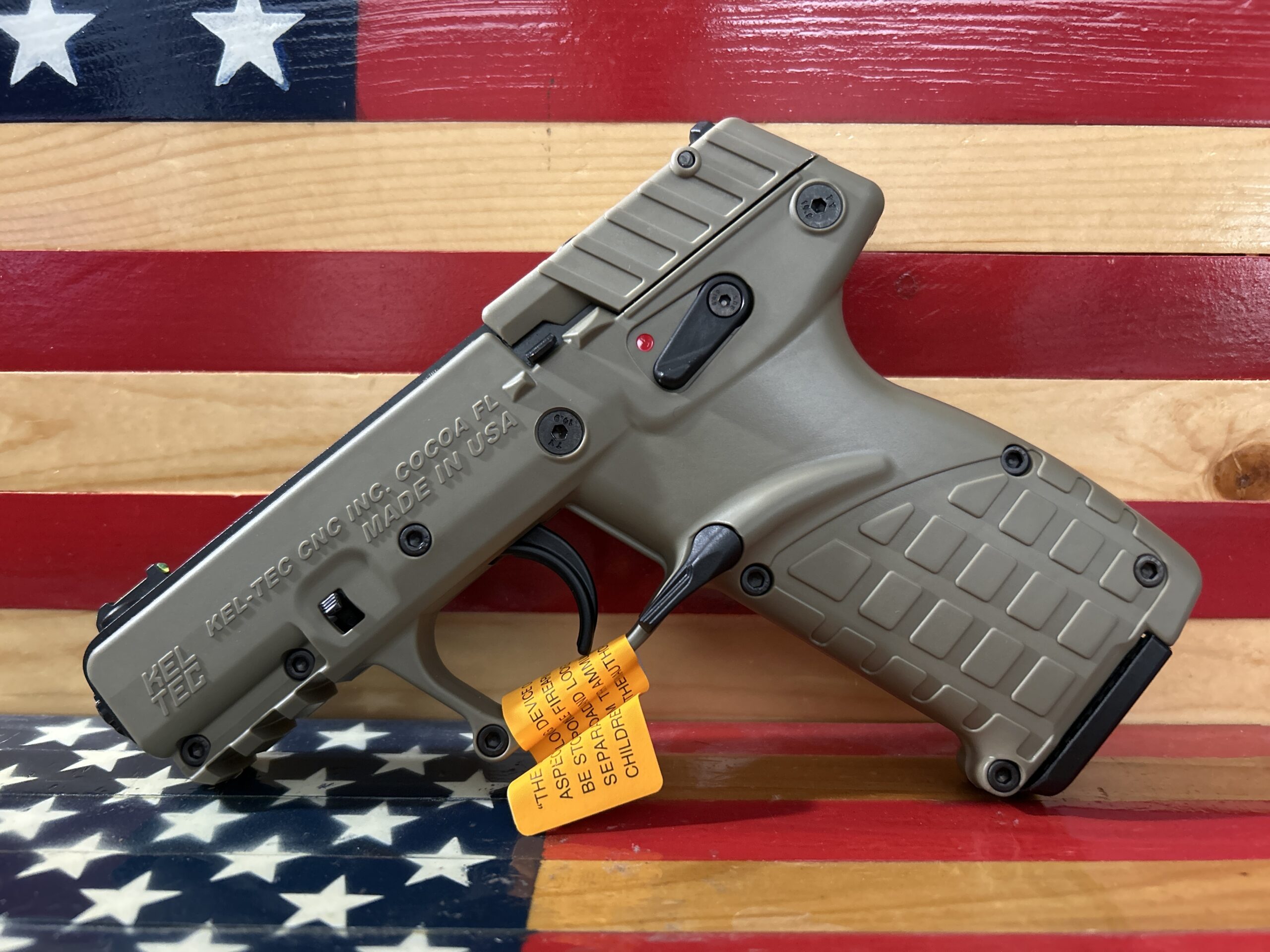 Pistol displayed on American flag background