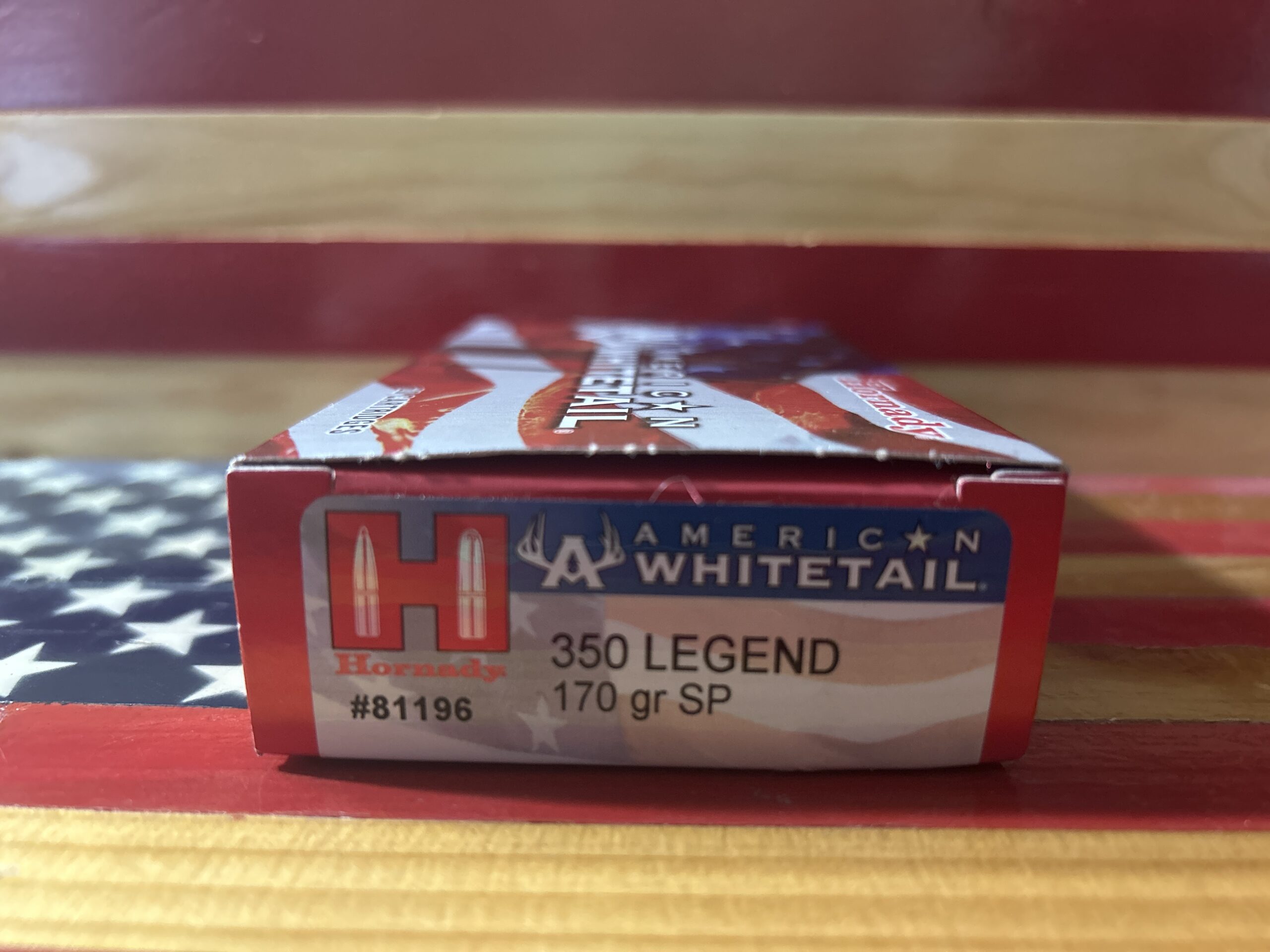 American Whitetail 350 Legend ammunition box close-up.