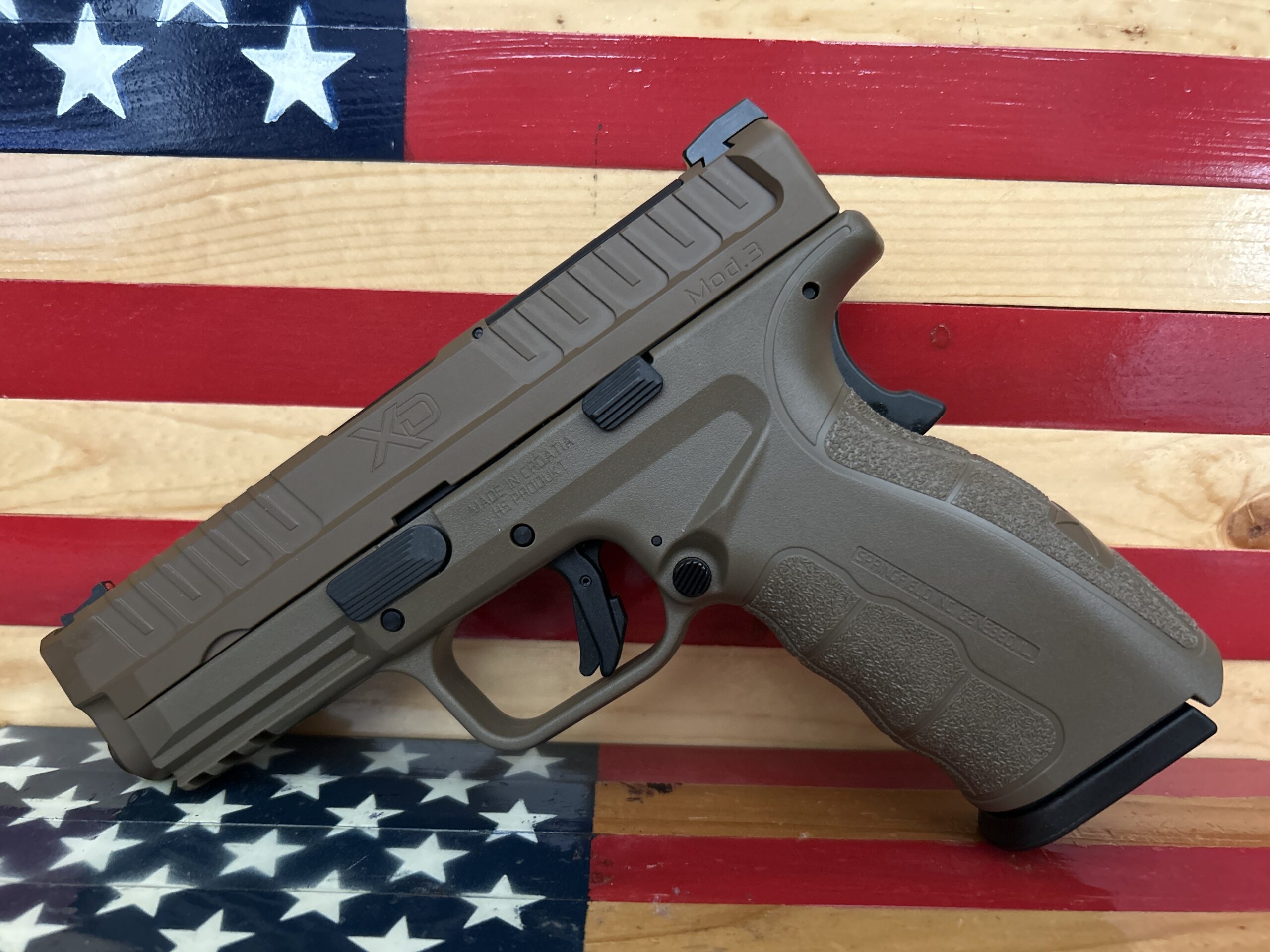 Handgun on American flag background