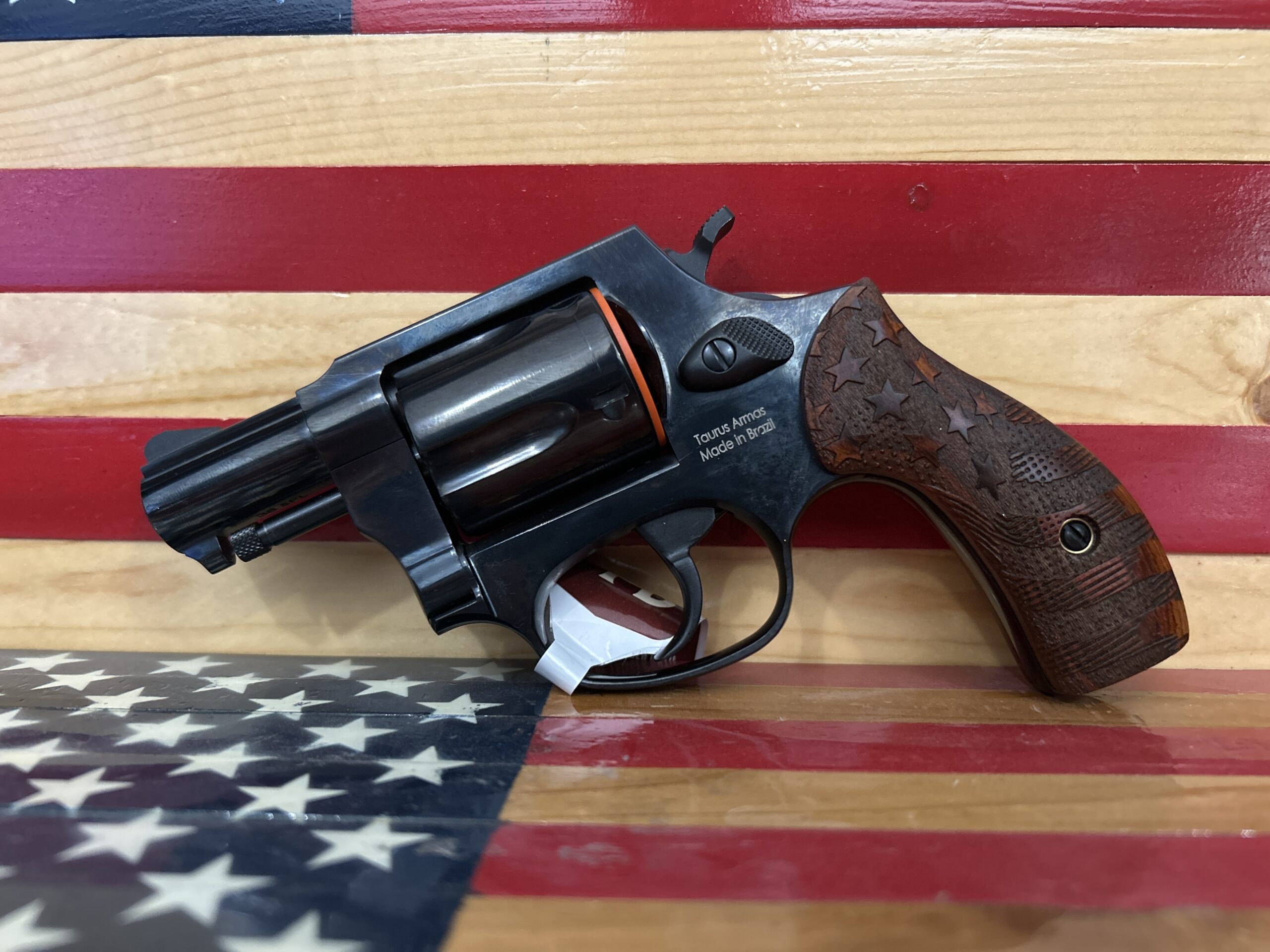 Revolver on American flag background
