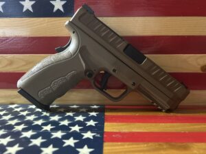 Handgun on American flag background
