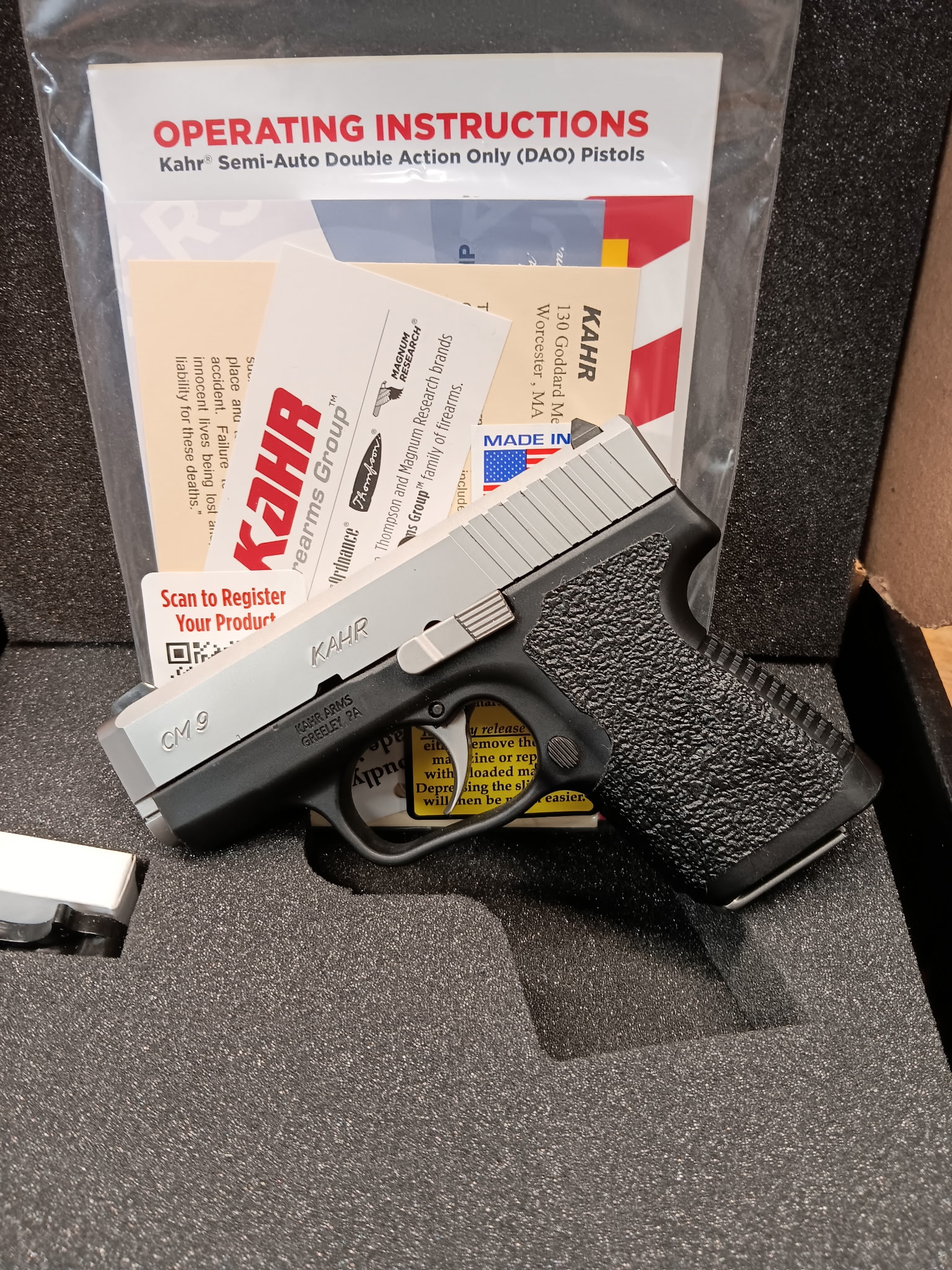 Kahr pistol with instructions and box.