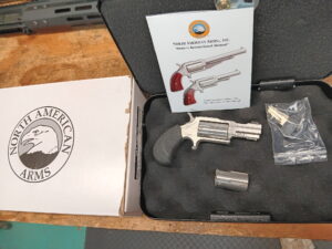 North American Arms revolver and instructional manual.