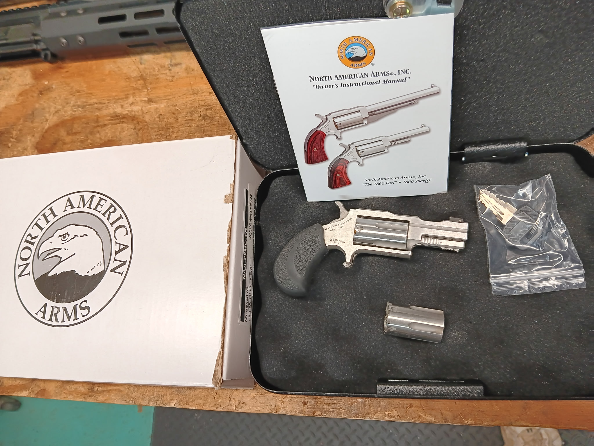 North American Arms revolver and instructional manual.