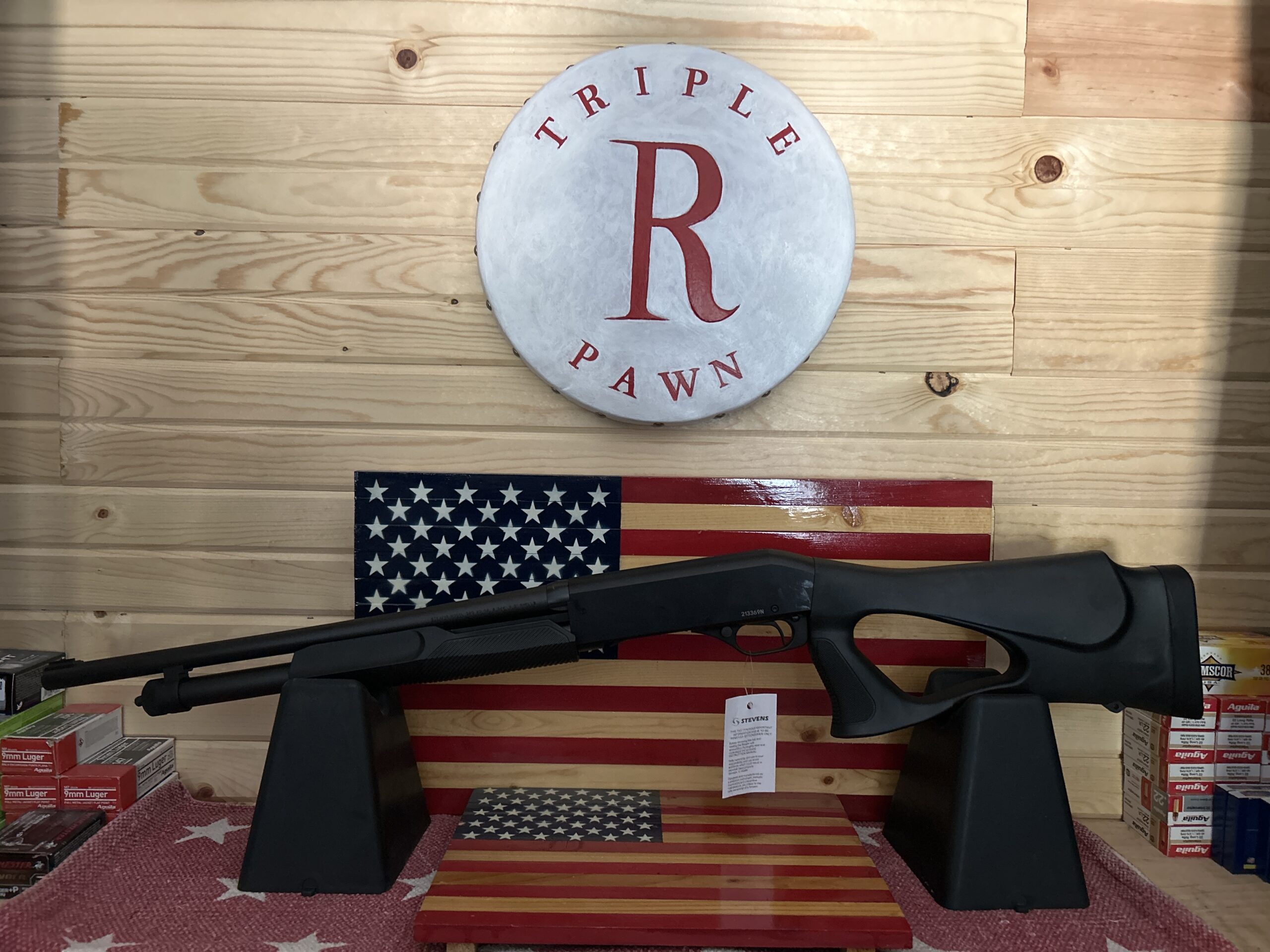 Shotgun displayed with American flag background