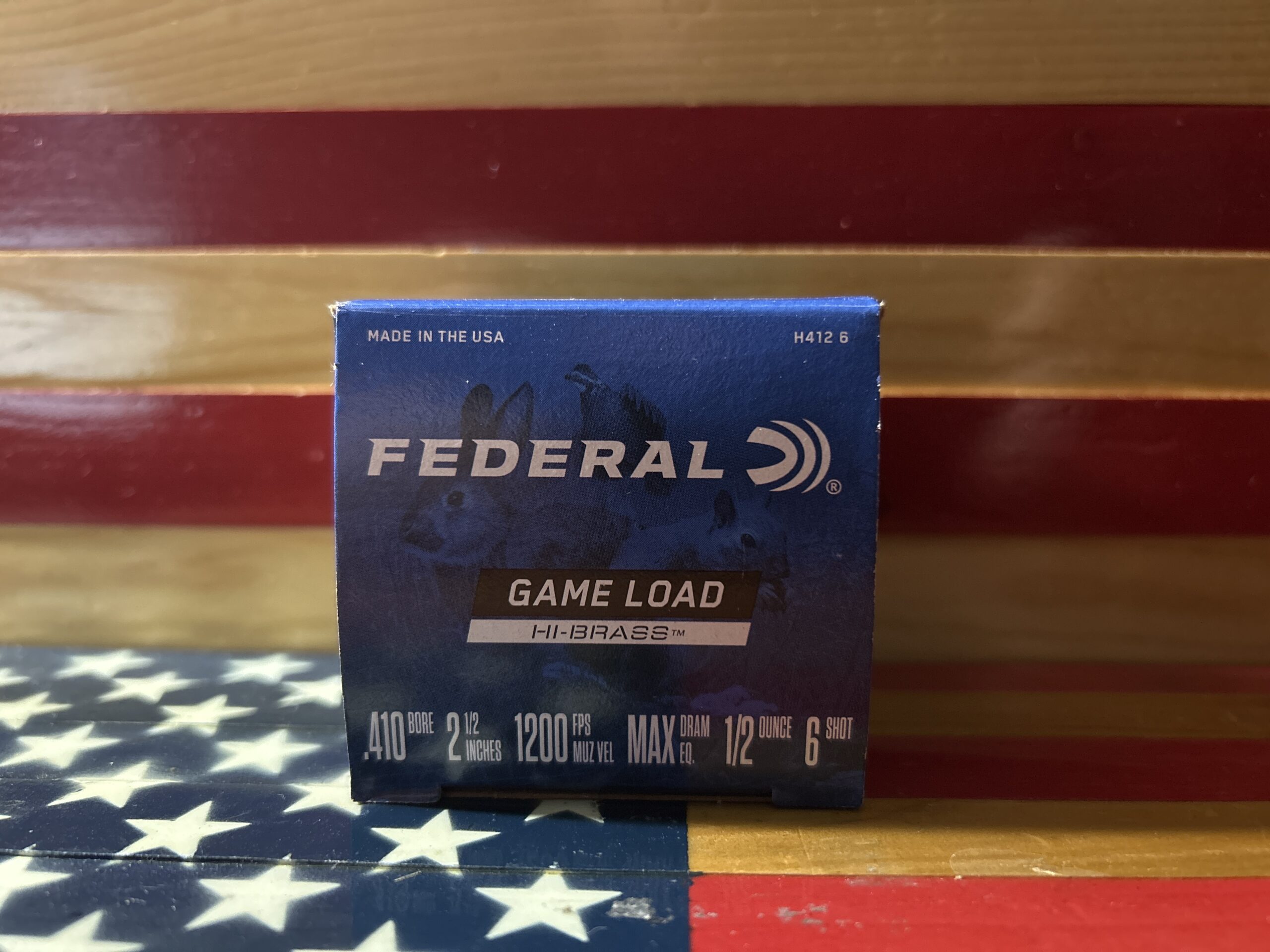 Federal Game Load ammunition box on flag background