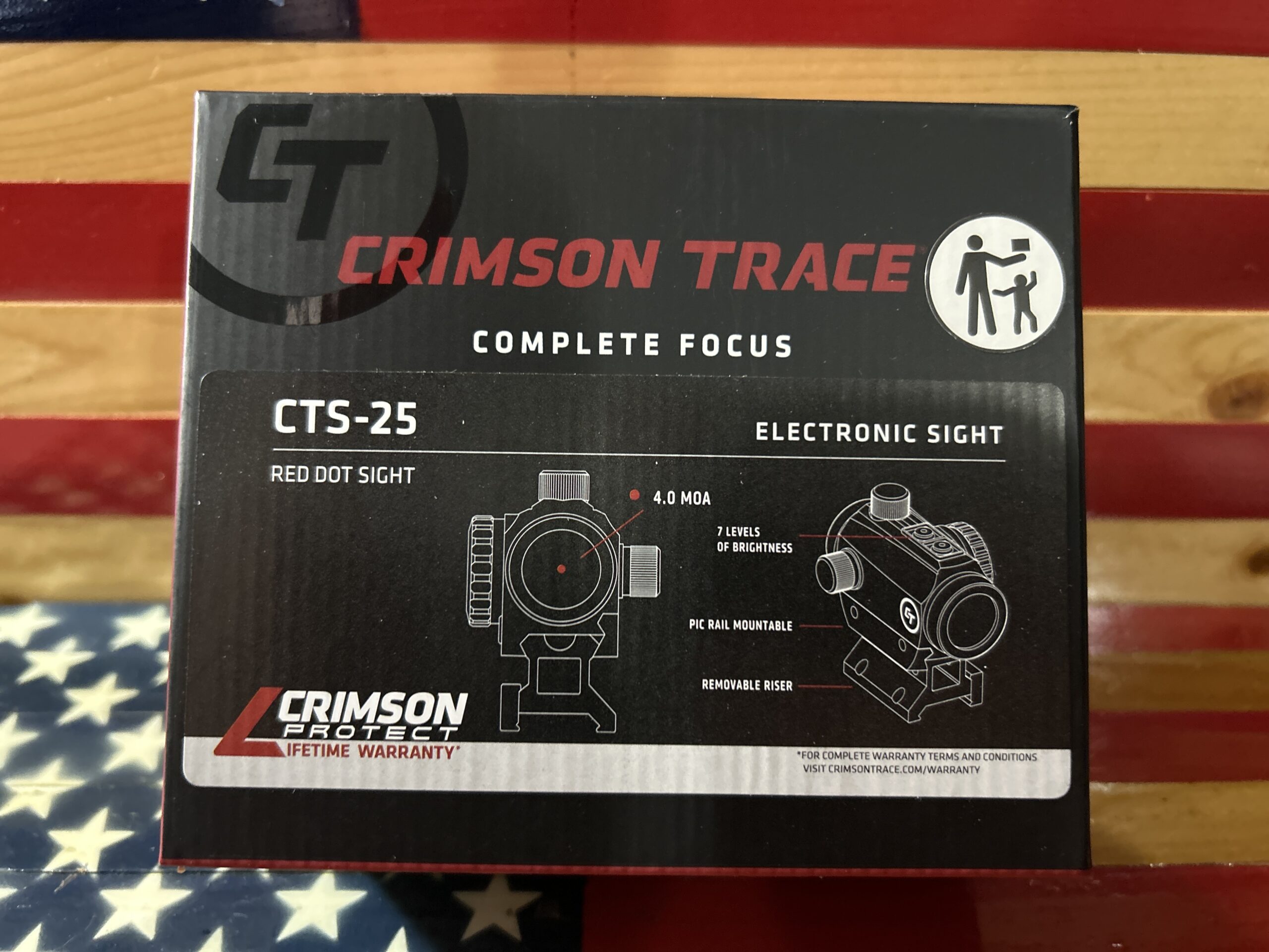 Crimson Trace CTS-25 red dot sight packaging.